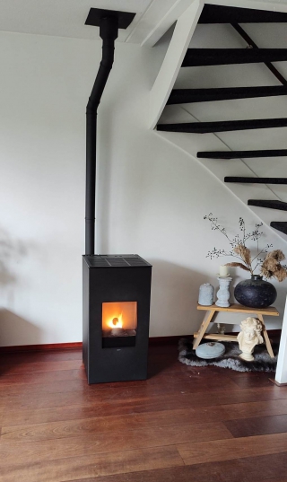 brown wooden fire place in front of white wooden door