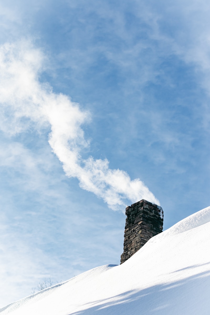 a person is skiing down a snowy hill